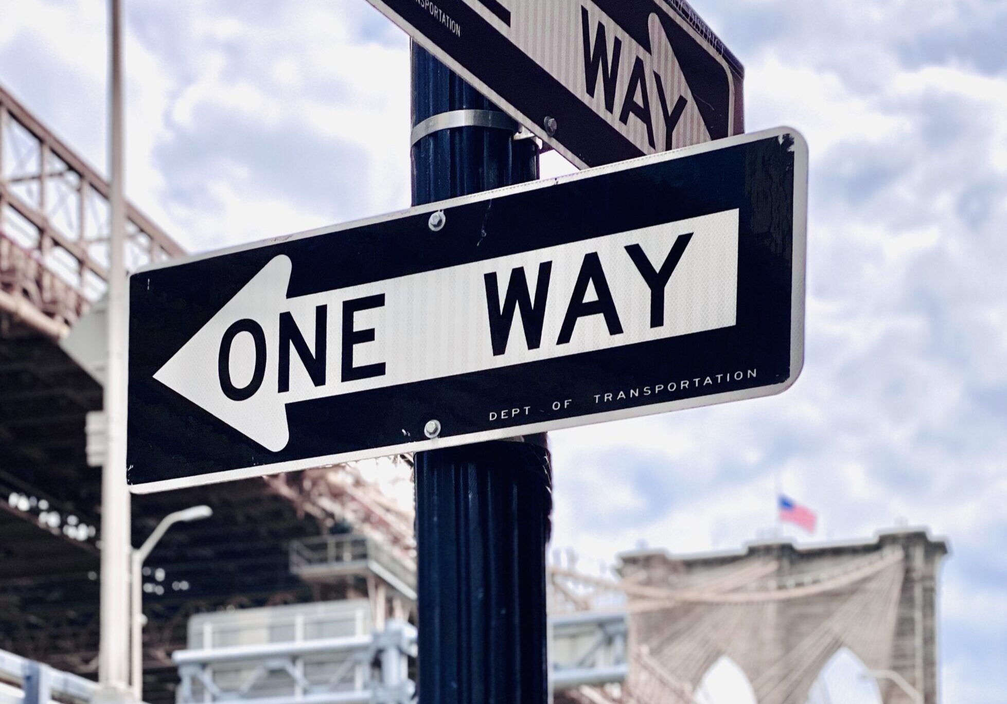 low-angle-view-road-sign-against-sky